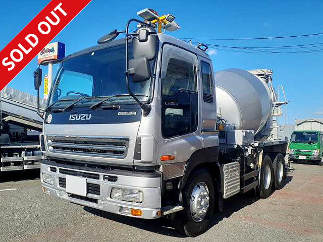 2007 model Isuzu Giga large concrete mixer truck with 2 differentials, Kayaba drum capacity 8.7m3, electric hopper cover *Approximately 320,000km on meter/vehicle inspection valid until February 2014*