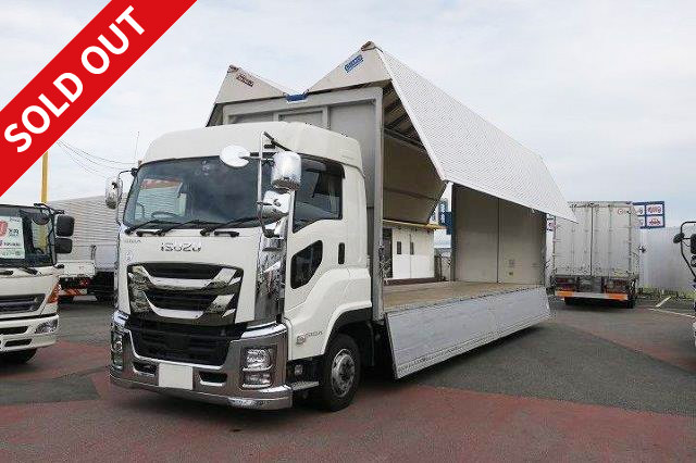 2016 Isuzu Giga, large aluminum wing, 4-axle low floor, high roof, rear air suspension, retarder, chrome finish, maintenance inspection record book included