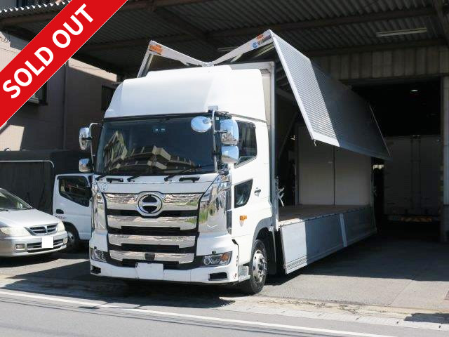 Now leased! 2017 Hino Profia, 4-axle low floor, large aluminum wing, high roof, dealer inspection record book included 