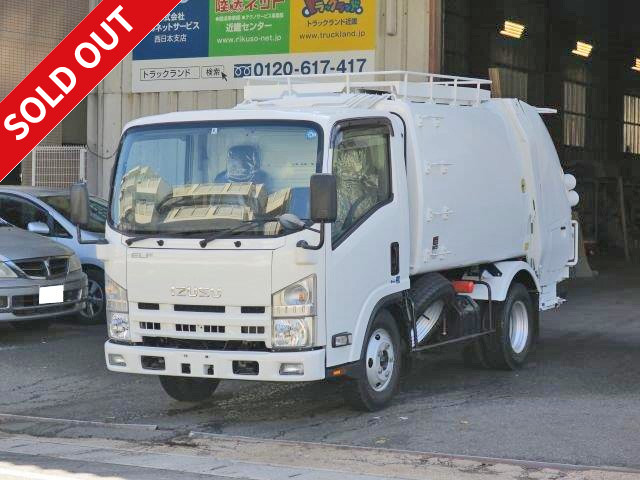 2009 model Isuzu Elf small packer (garbage truck) Kyokuto Kaihatsu press type 4.6 cubic meters with continuous switch, high floor, approx. 15,000 km driven