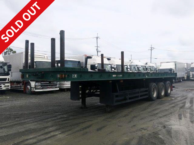 1993 model Trailmobile 3-axle high deck cutting board semi trailer with 3 pairs of stanchion holes and 6 stanchions 