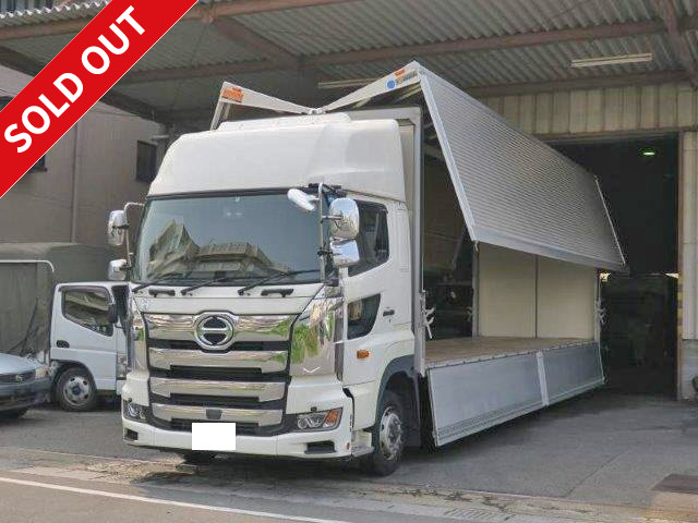 Now leased! 2017 Hino Profia, 4-axle low-floor, large aluminum wing, high roof, rear air suspension, retarder, dealer inspection record book included